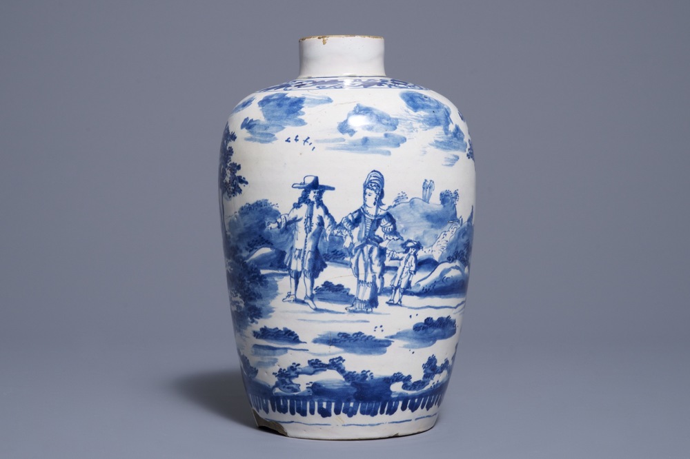 A Dutch Delft blue and white vase with a couple with child, 1st half 18th C.