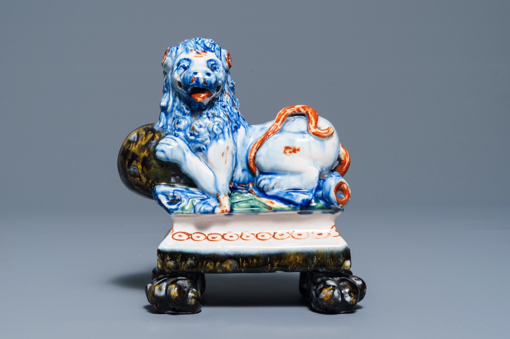 A polychrome Dutch Delft model of a lion, 19th C.