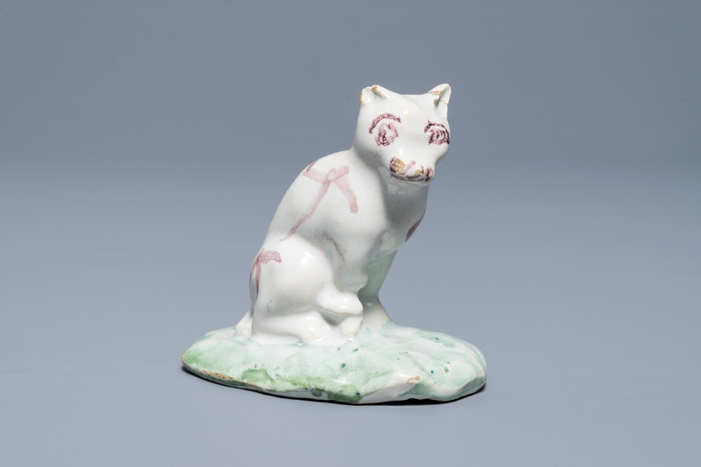 A Brussels faience model of a cat, 18th C.