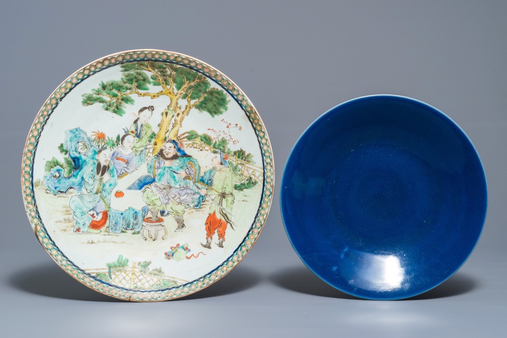 A Chinese famille verte charger and a monochrome blue dish, 19th C.