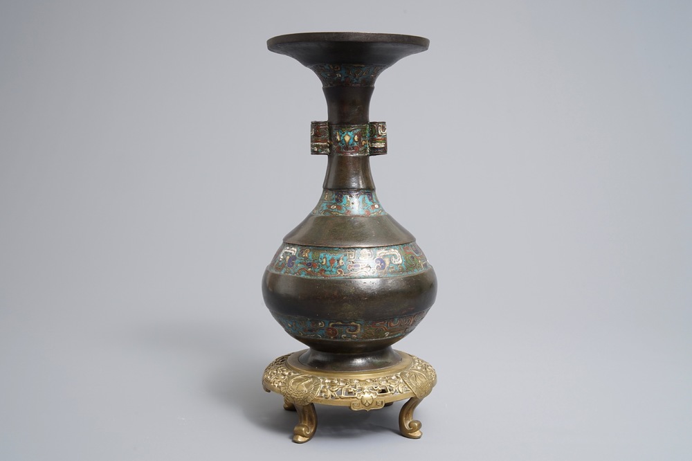 A Chinese bronze and champlev&eacute; enamel vase, 17/18th C.