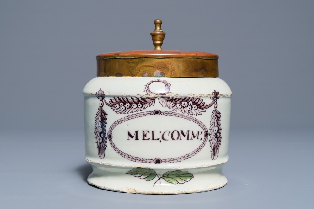 A polychrome Dutch Delft drug jar with brass lid, early 19th C.