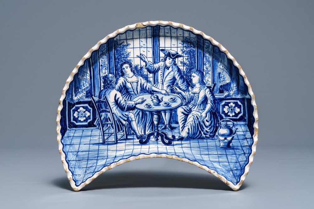 A Frisian blue and white demi lune tea scene tray, 19th C.