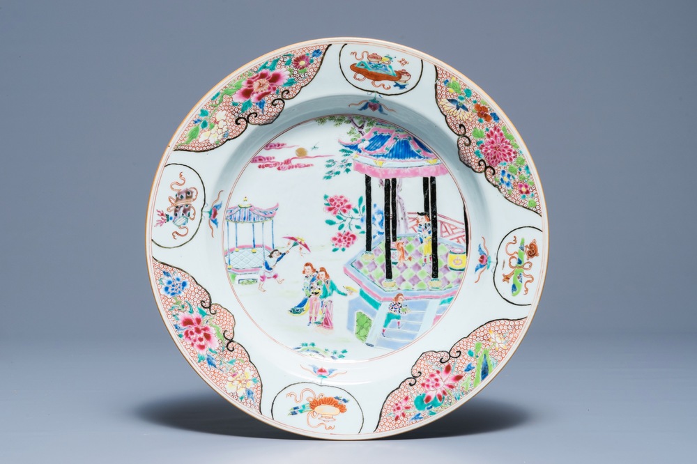 A Chinese famille rose dish with Europeans near a pagoda, Qianlong