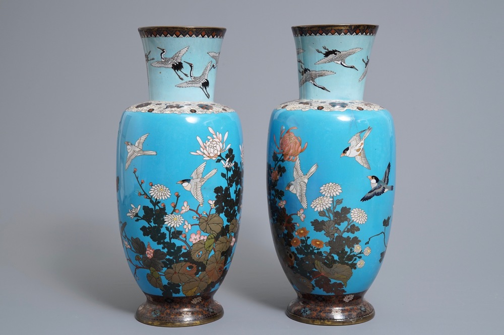 A pair of Japanese cloisonn&eacute; vases with birds and flowers, Meiji, 19th C.