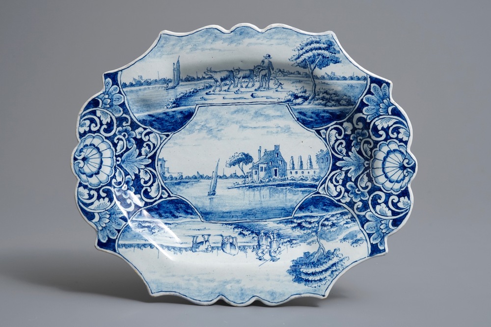 A Dutch Delft blue and white dish with fine landscapes, 18th C.