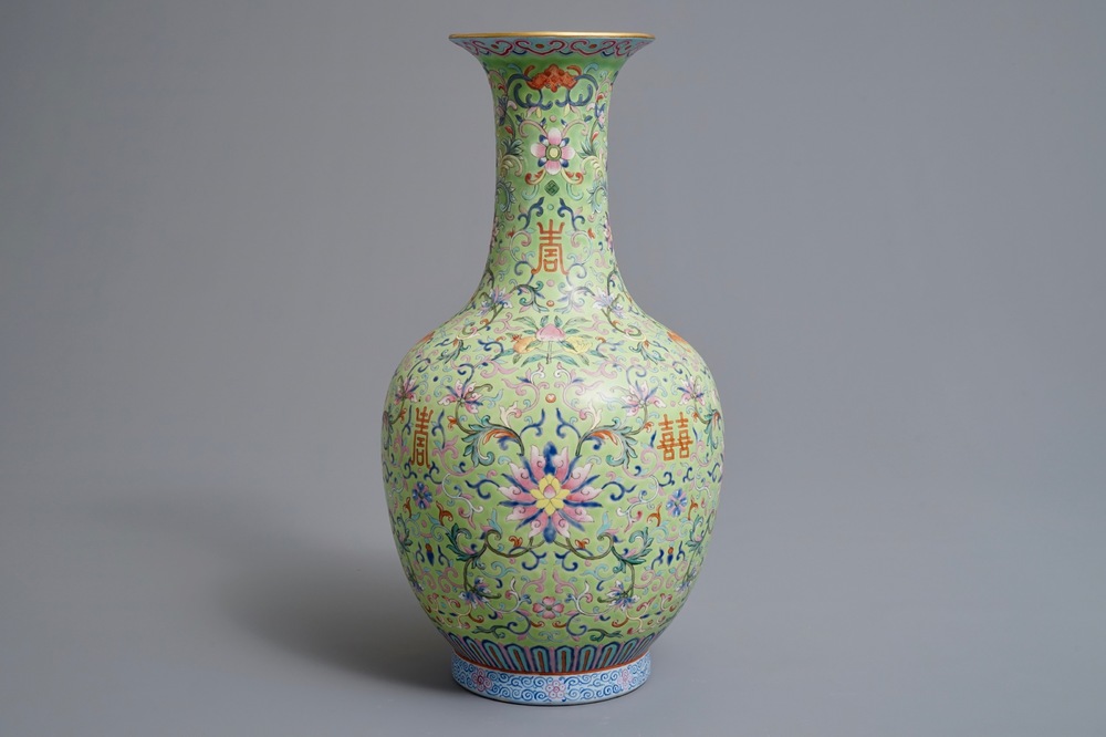 A Chinese famille rose lime-green ground bottle vase, Jiaqing mark and of the period