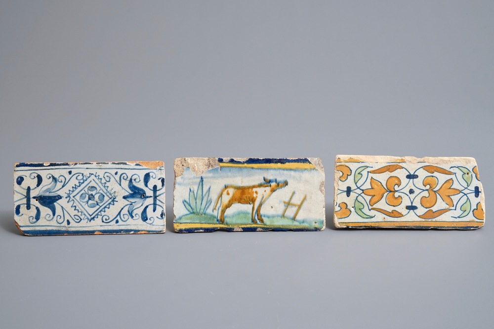 Three polychrome and blue and white Dutch Delft maiolica border tiles, early 17th C.
