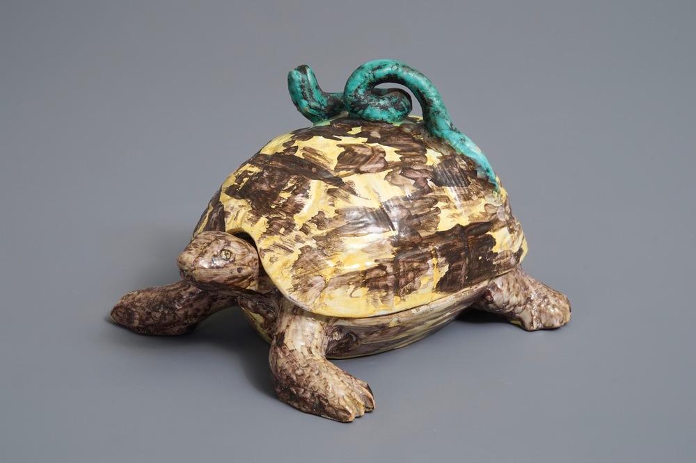 A polychrome Brussels faience box and cover in the shape of a turtle, 18th C.