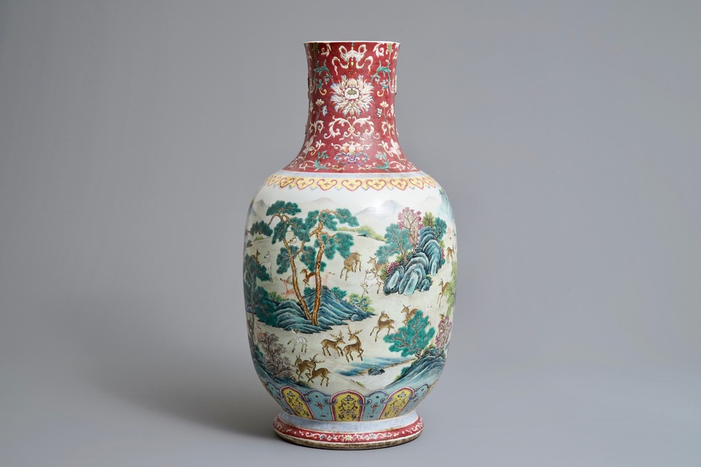 A Chinese famille rose vase with deers in a landscape, Qianlong mark, 19/20th C.