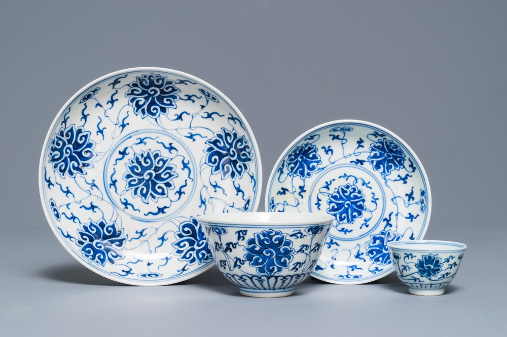 A Chinese blue and white 'lotus' plate, a bowl and a cup and saucer, Guangxu mark, 19/20th C.