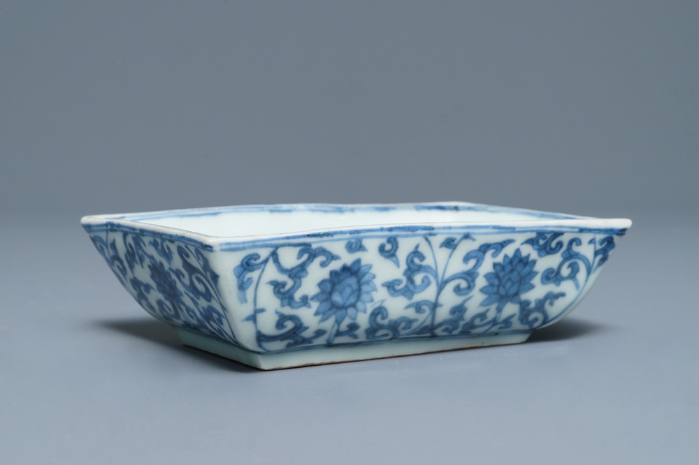 A rectangular Chinese blue and white dish with a phoenix among lotus scrolls, Wanli mark, 19/20th C.