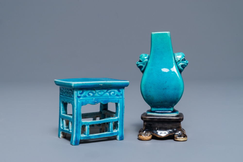 A Chinese turquoise and aubergine-glazed miniature vase on stand and a table, Kangxi