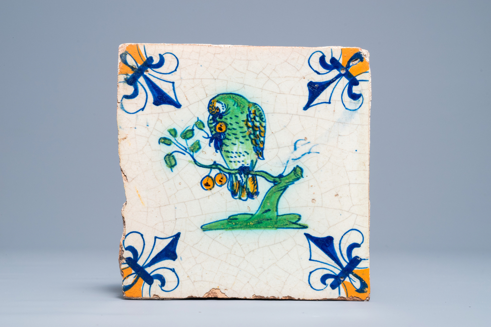 A polychrome Dutch Delft tile with a parrot, 1st half 17th C.