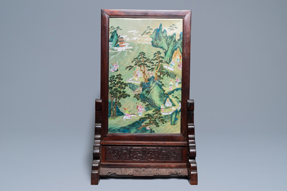 A large Chinese famille rose screen on hongmu stand, Qianlong