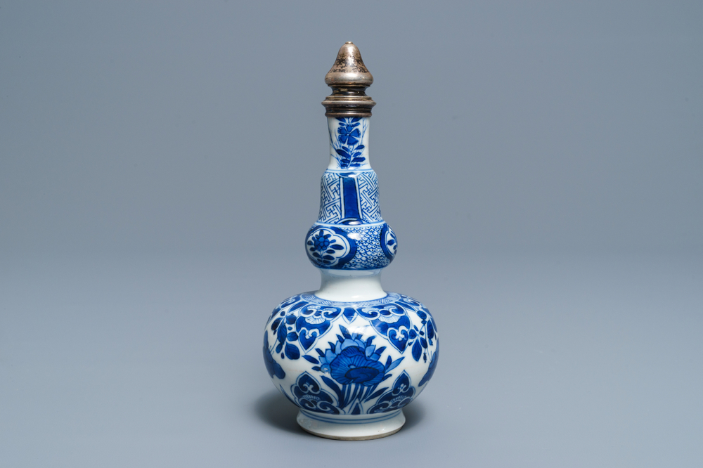 A Chinese silver-mounted blue and white Persian market bottle vase, Kangxi