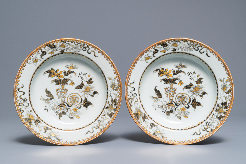 A pair of Chinese capucin-ground grisaille and gilt armorial plates, Qianlong