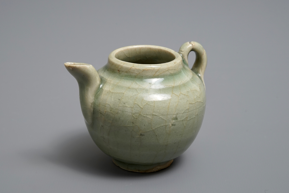 A Chinese celadon teapot or ewer, Song/Yuan