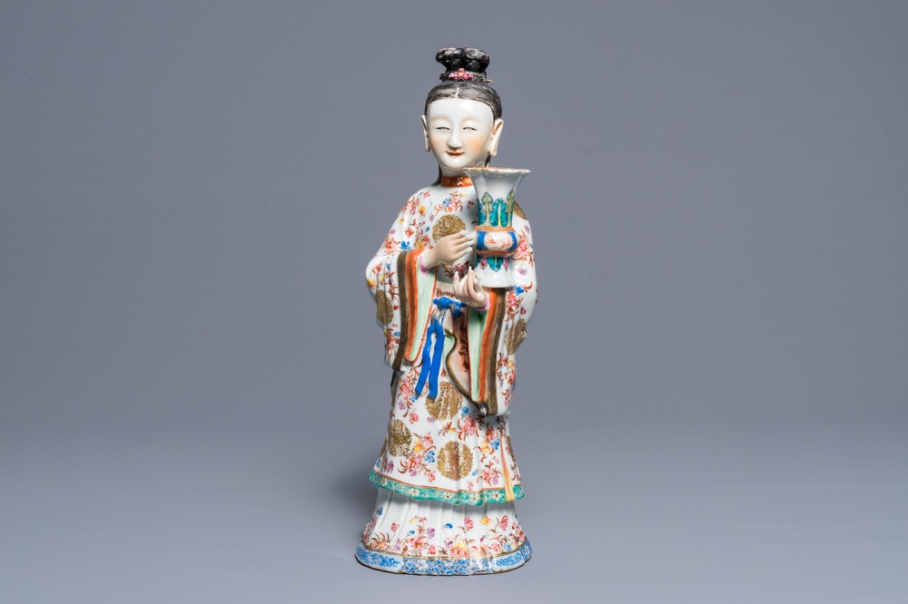 A large Chinese famille rose candle holder modelled as court lady, Qianlong