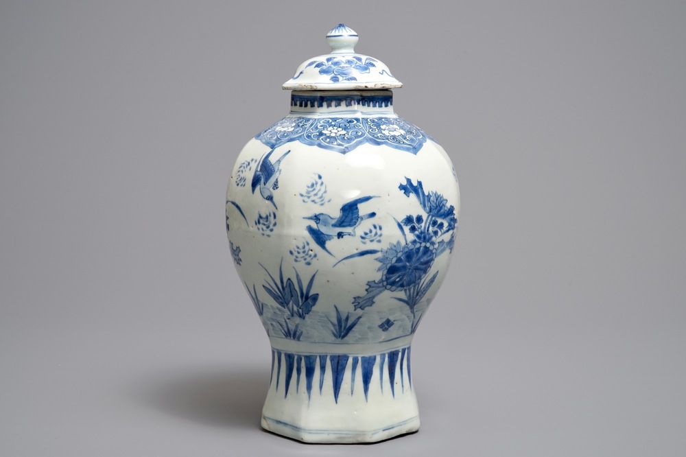 A Chinese blue and white covered vase with birds among flowers, Transitional period