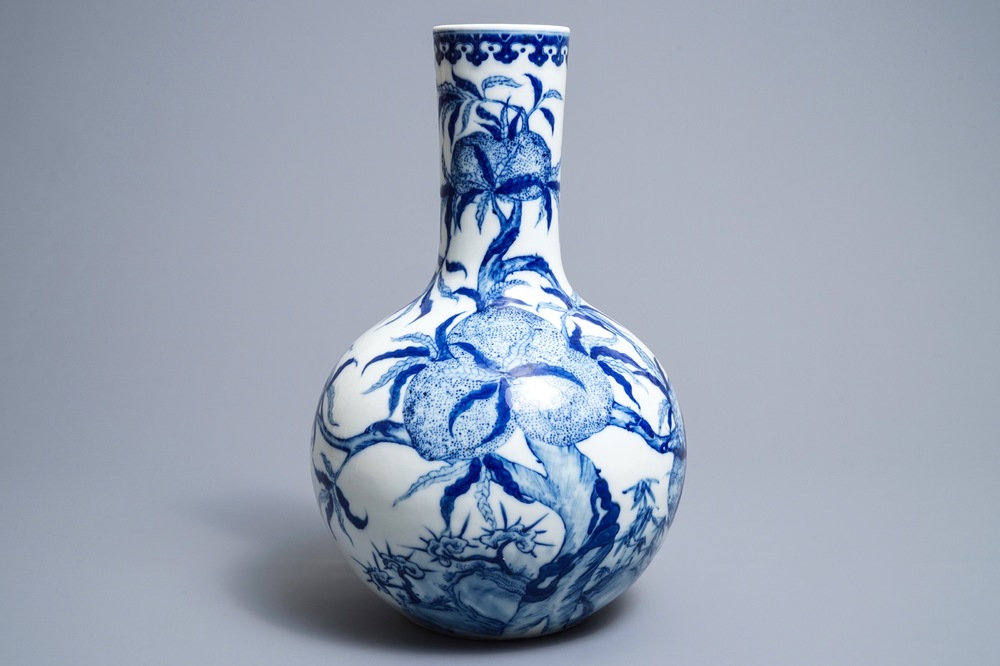 A Chinese blue and white '9 peaches' bottle vase, Yongzheng mark, Republic, 20th C.