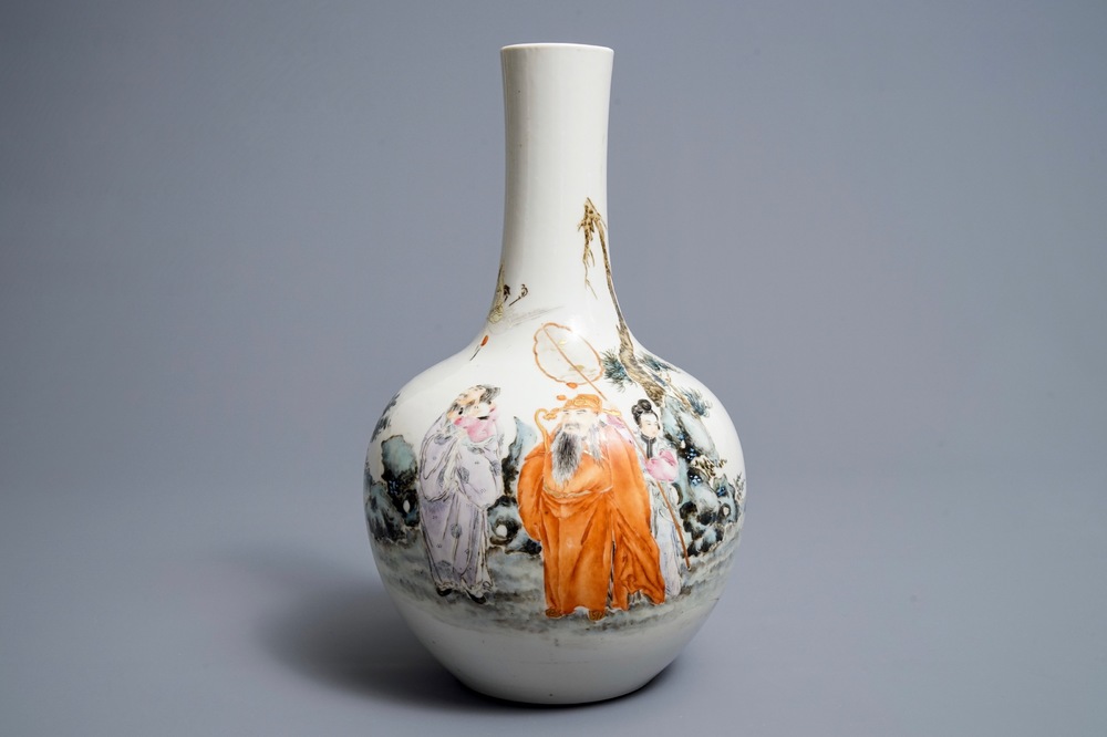 A Chinese famille rose 'Immortals' bottle vase, Qianlong mark, Republic, 20th C.