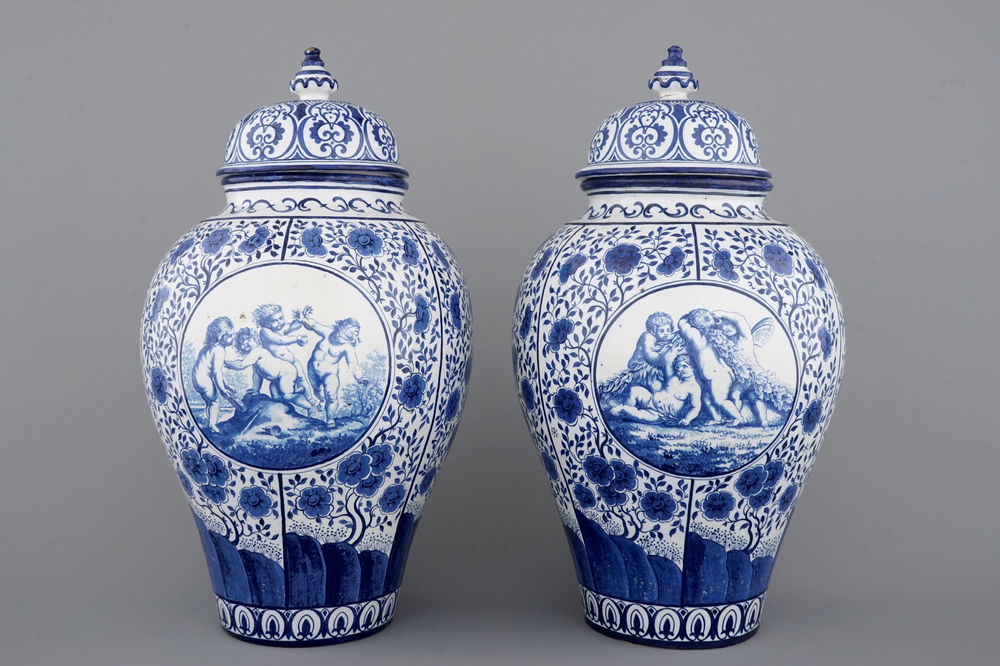 Une paire de grands vases couverts en fa&iuml;ence de Bruxelles en bleu et blanc, sign&eacute;s et dat&eacute;s 1861