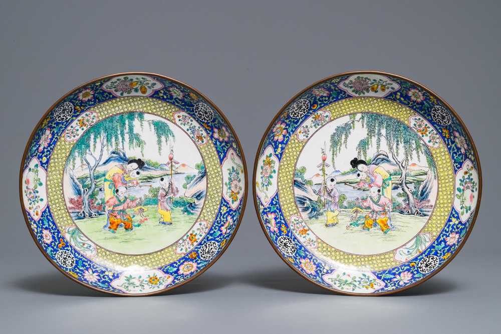 A pair of Chinese Canton enamel plates with ladies and children, Qianlong mark, 19th C.