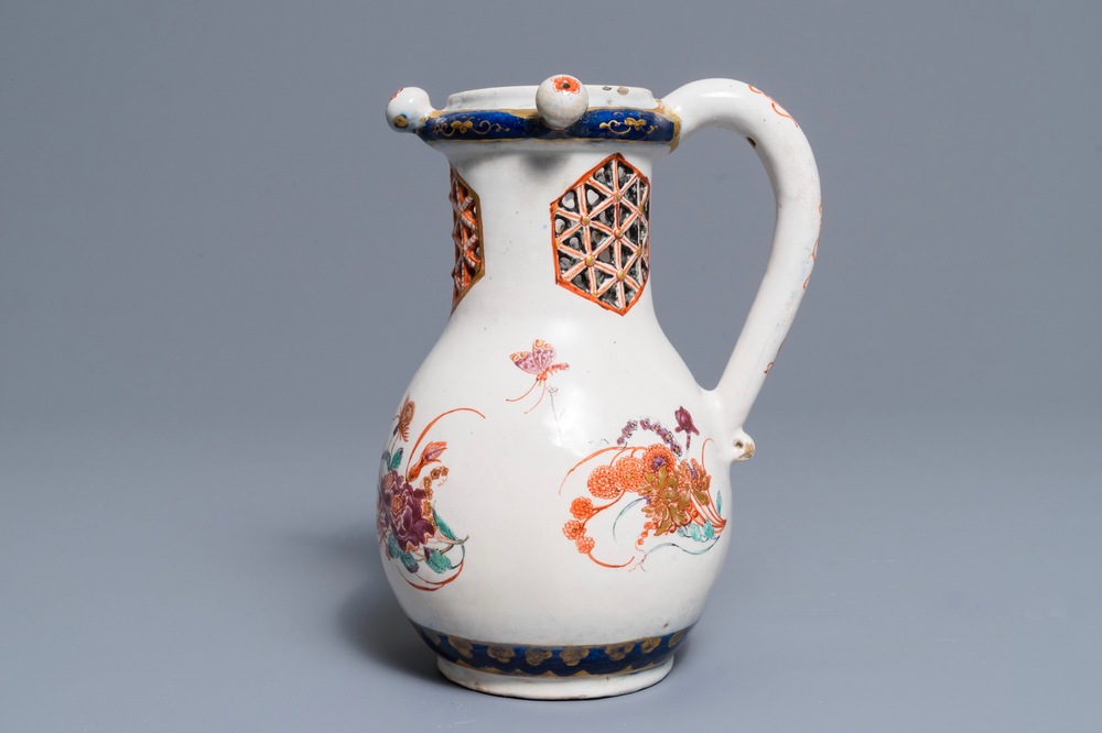 A polychrome petit feu and gilded Dutch Delft puzzle jug with insects and flowers, 1st half 18th C.