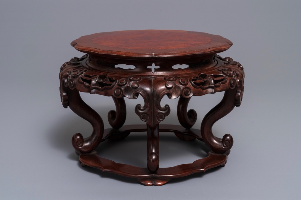 A Chinese rootwood-top carved wood stand, 19/20th C.