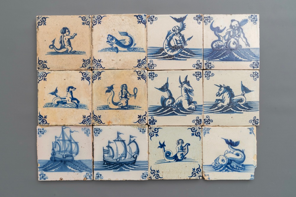 Twelve Dutch Delft blue and white tiles with sea creatures and ships, 17/18th C.