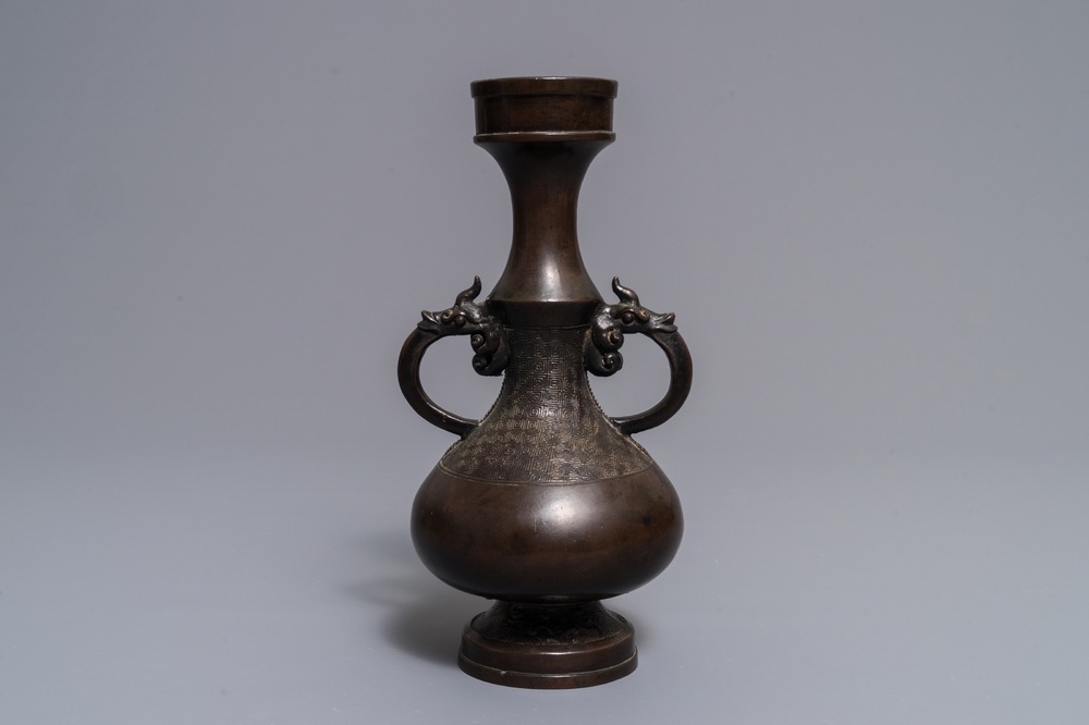 Een Chinese bronzen vaas met reli&euml;fdecor, Yuan/Ming
