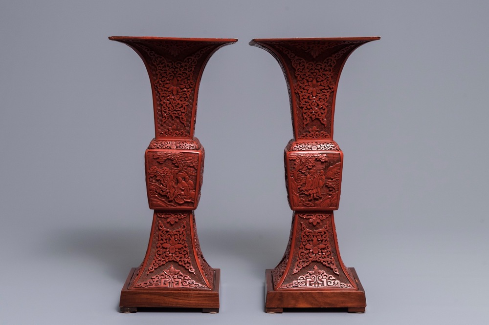 A pair of large Chinese carved cinnabar lacquer 'gu' vases, 18/19th C.