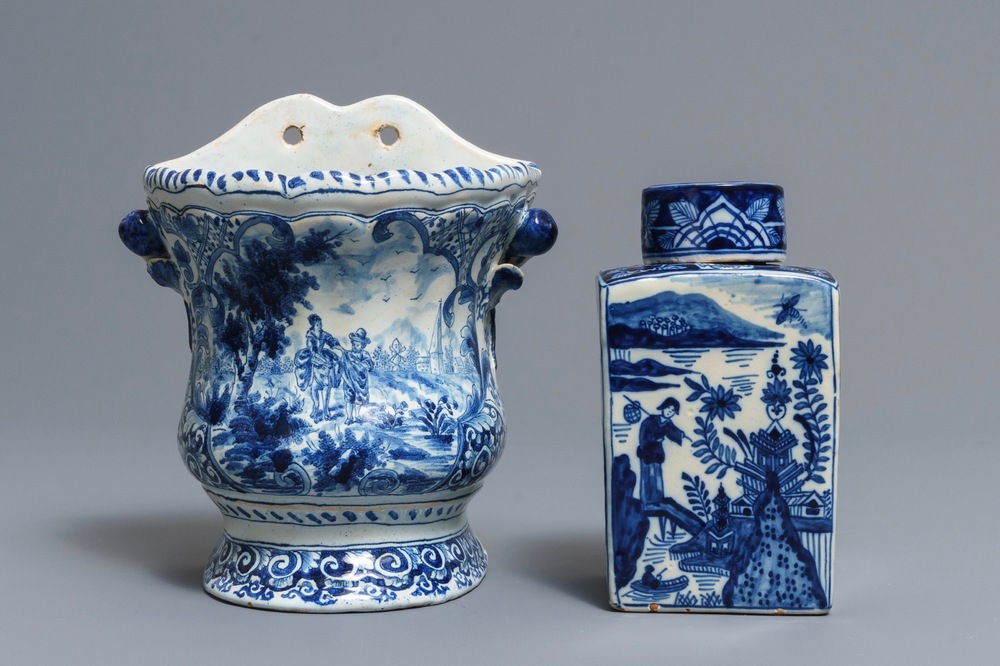 A Delft-style blue and white covered tea caddy and a wall vase, France, 19th C.