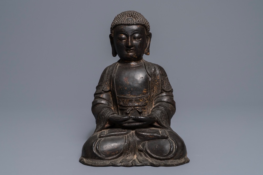 A Chinese gilt-lacquered bronze figure of Amithaba Buddha, Ming