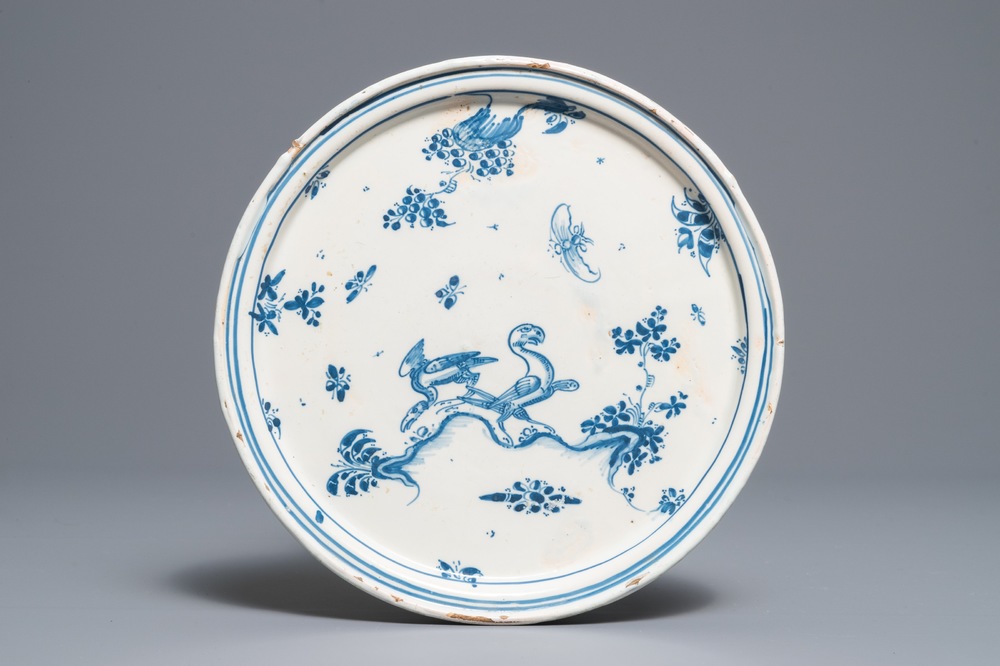 An Alcora faience blue and white tazza with birds and insects, Spain, 18th C.