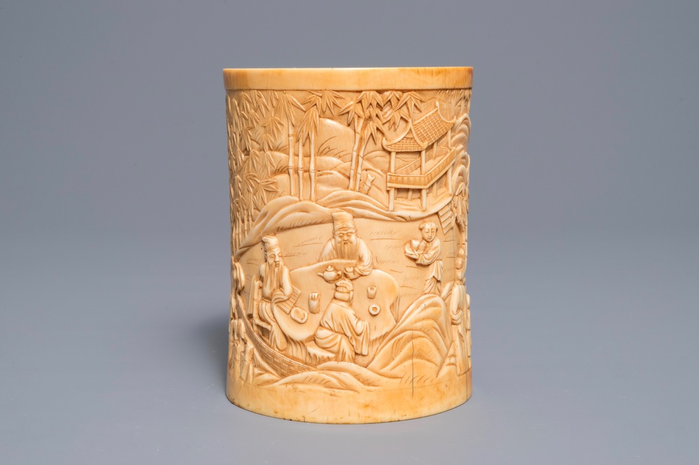 A Chinese carved ivory 'Seven Sages of the Bamboo Grove' brush pot, 18th C.