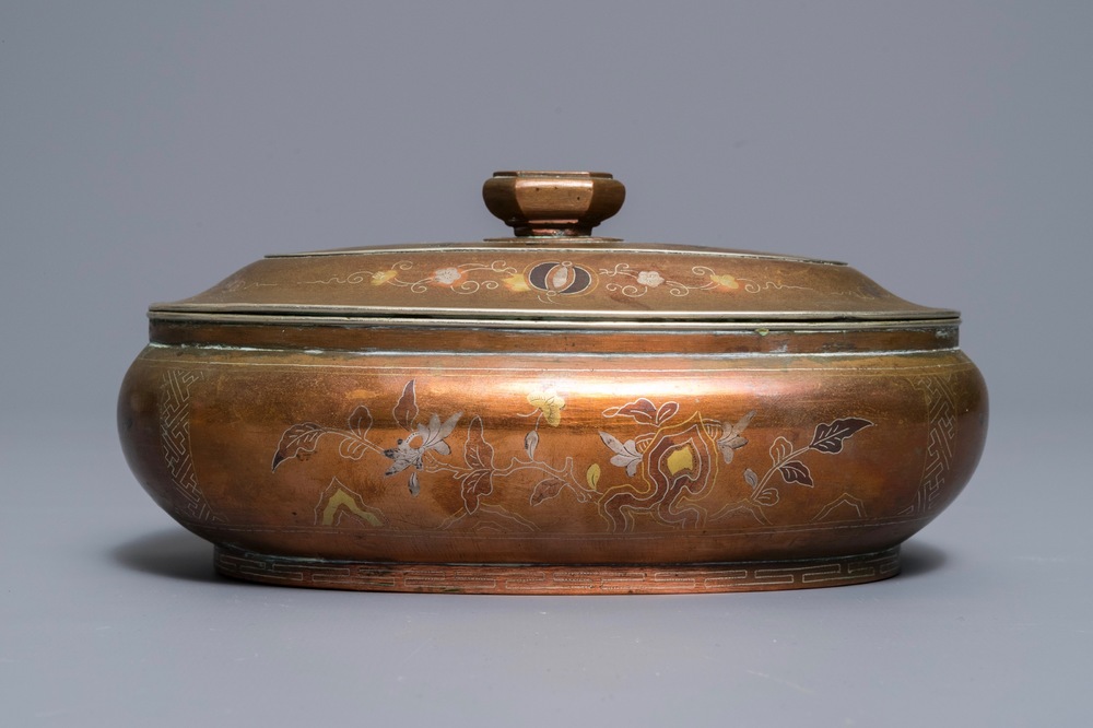 A Chinese inlaid brass box and cover, 19th C.