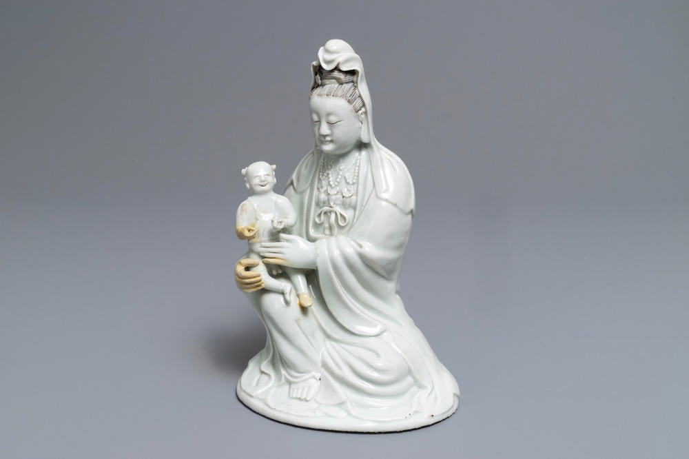 A Chinese blanc de Chine model of Guanyin and child, Qianlong