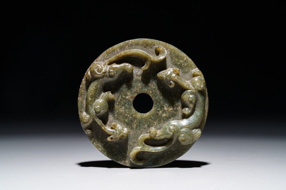 A Chinese dark green jade bi disc with chilong, 19/20th C.