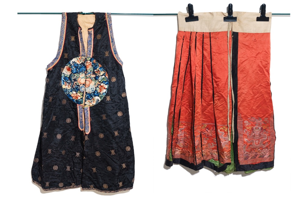 Two Chinese embroidered silk woman&rsquo;s clothes, 19th C.