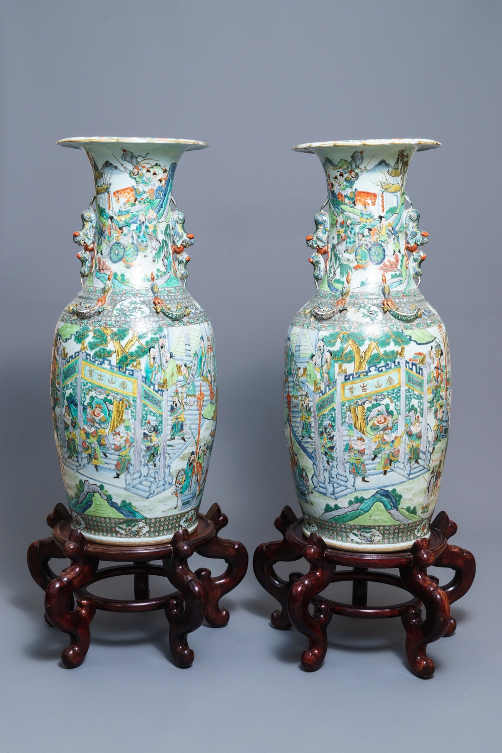 A pair of very large Chinese famille verte vases with fine narrative design, 19th C.