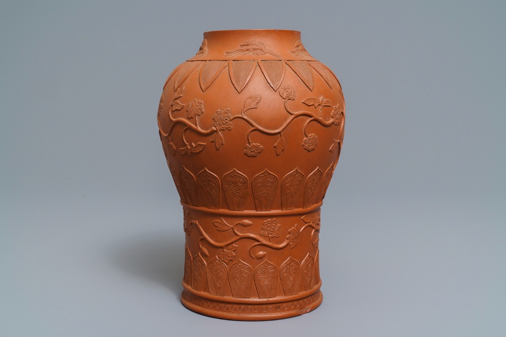 A Chinese Yixing stoneware baluster vase with applied design, Kangxi