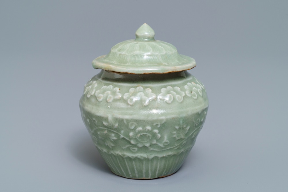 A small Chinese Longquan celadon vase and cover with underglaze design, Ming
