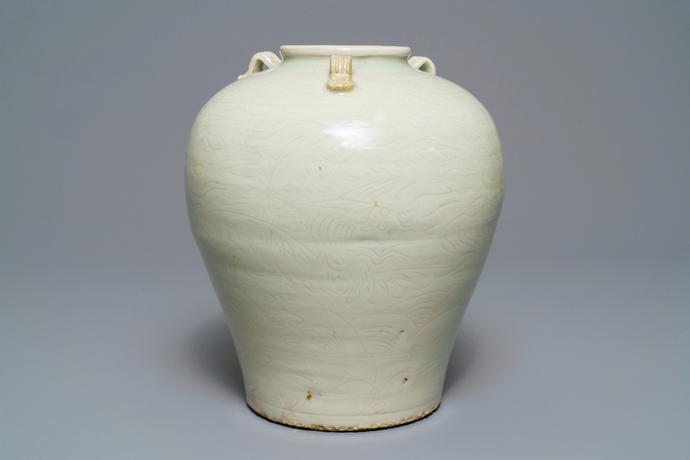 An incised Chinese celadon-glazed Swatow vase, Ming