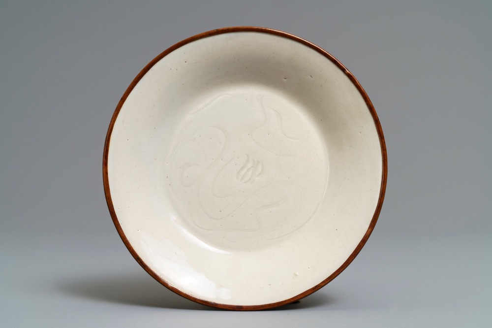 A Chinese dingyao carved 'ducks' plate, probably Song