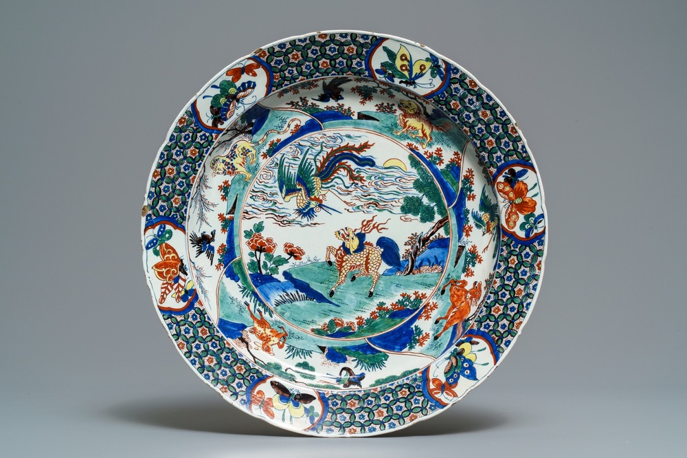An exceptional polychrome Dutch Delft famille verte-style 'mythical beasts' dish, 18th C.