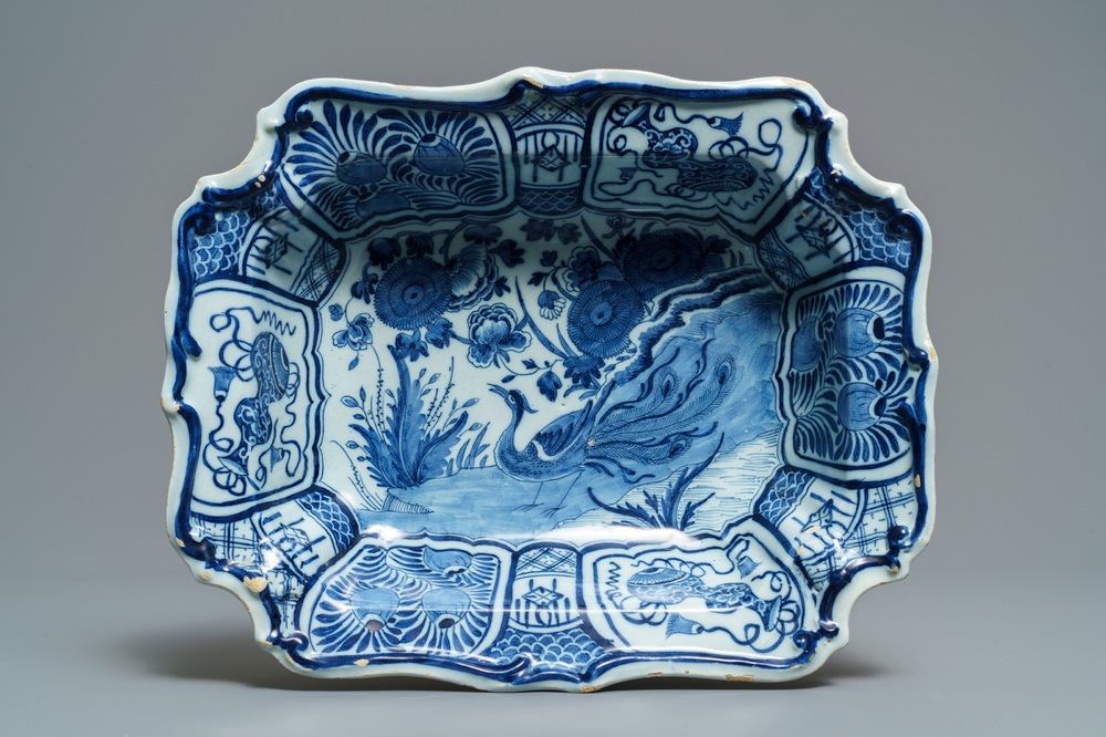 A rectangular Dutch Delft blue and white salad bowl with a peacock, 18th C.
