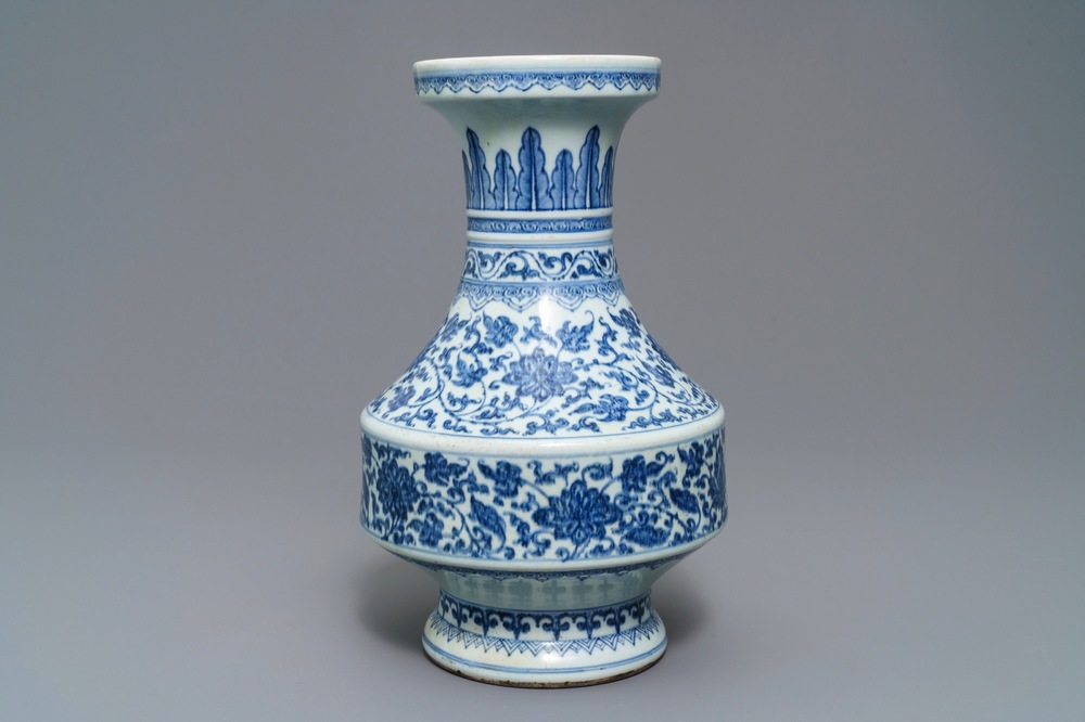 A Chinese blue and white flower scroll vase, Qianlong