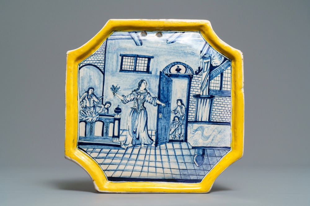 A Dutch Delft blue and white yellow border 'tobacco shop' plaque, 18th C.